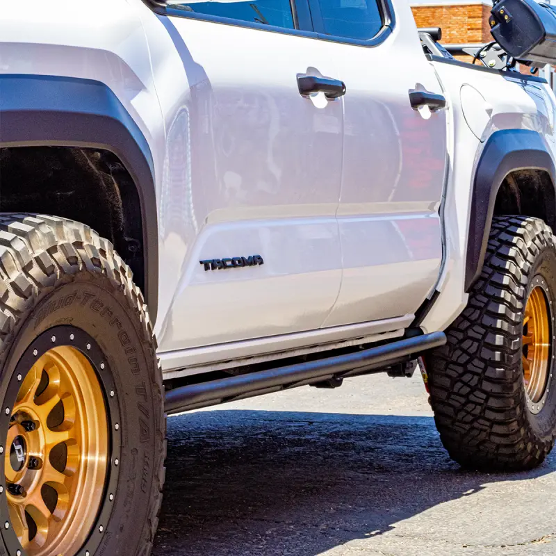 Cali Raised Rock Sliders For 2024+ Toyota Tacoma Trail Edition – Double Cab Long Bed, Kick-Out Design, Raw Finish 1